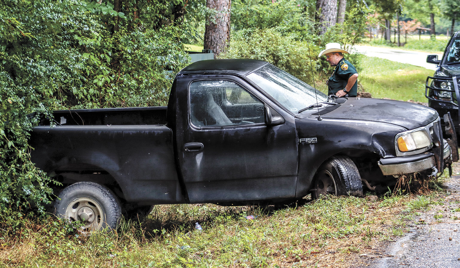 Slippery road leaves truck in ditch